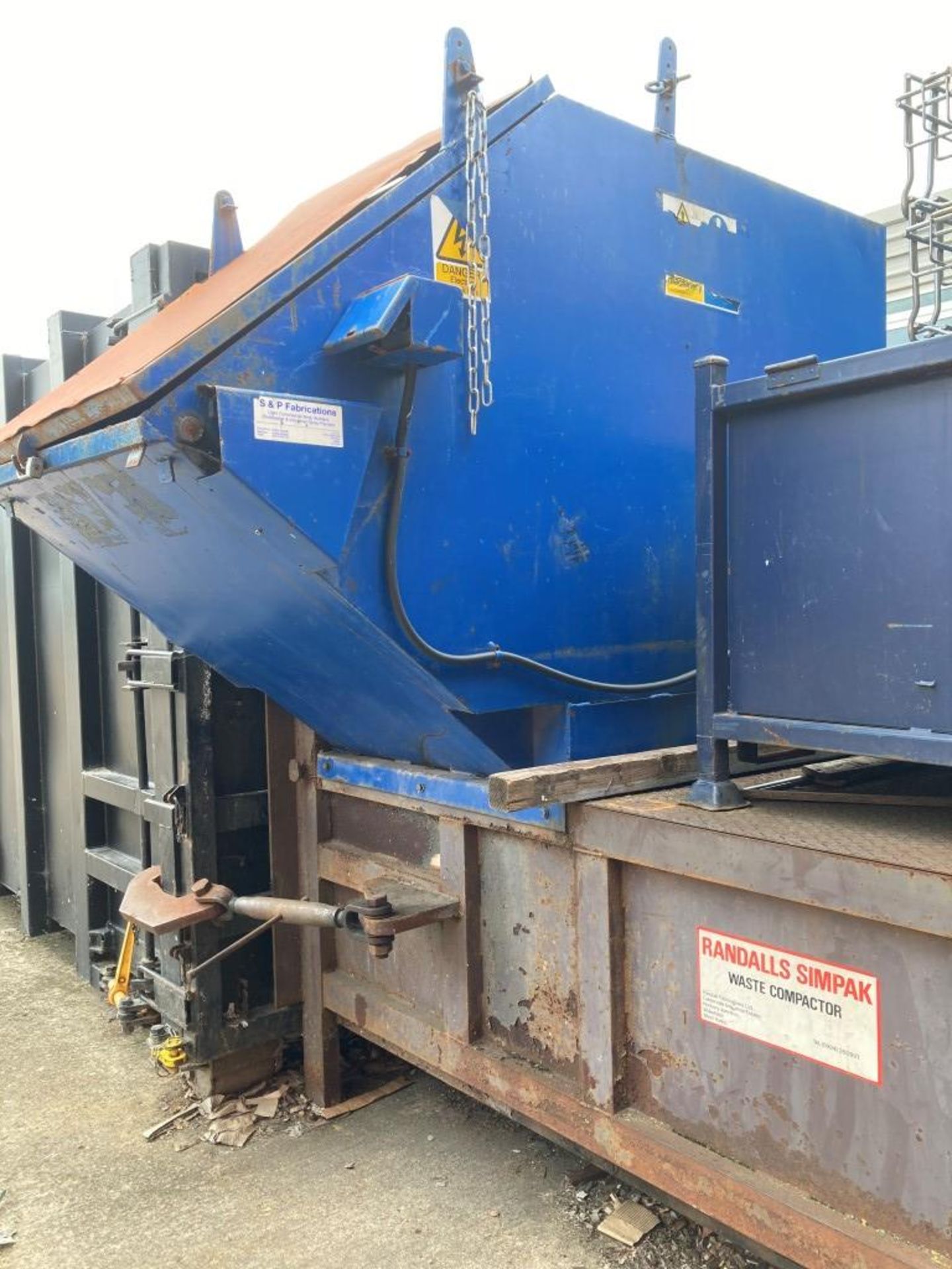 Randalls Simpak waste compactor with mounted loading skip - Image 5 of 6