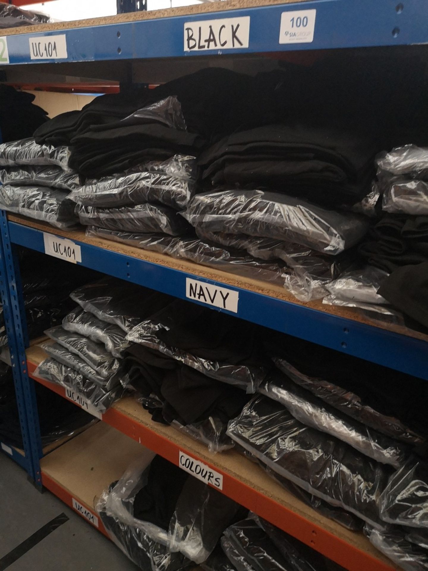 Quantity of Uneek Black Polo Shirts