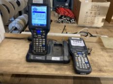 (2) Intermec 1007CP01 Product Scanners with charging doc station