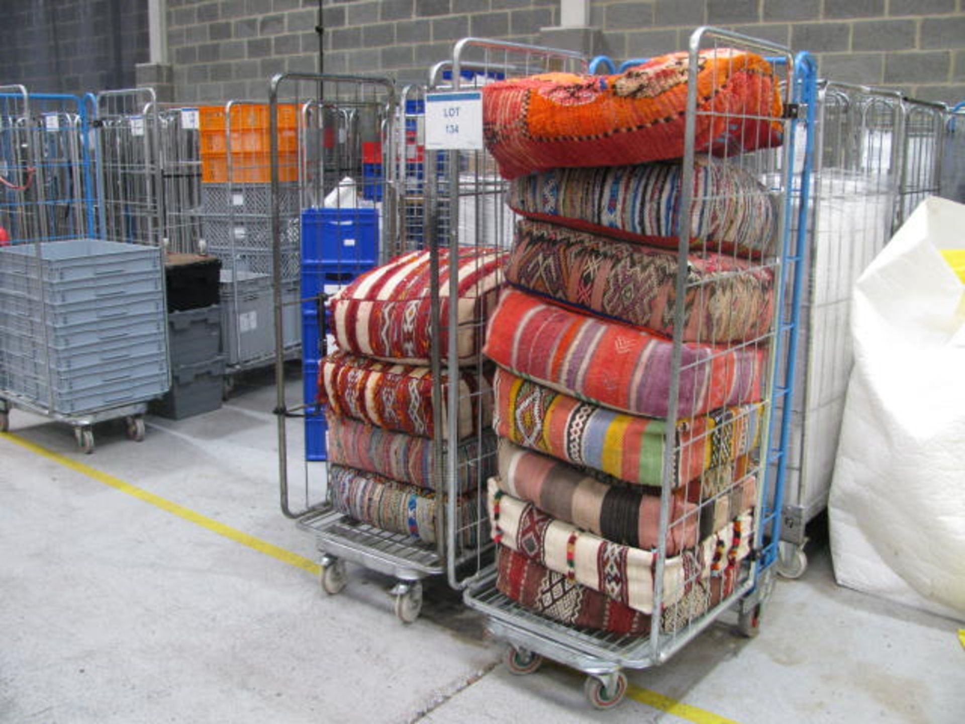 (2) Steel trolley cages with various Moroccan style cushions