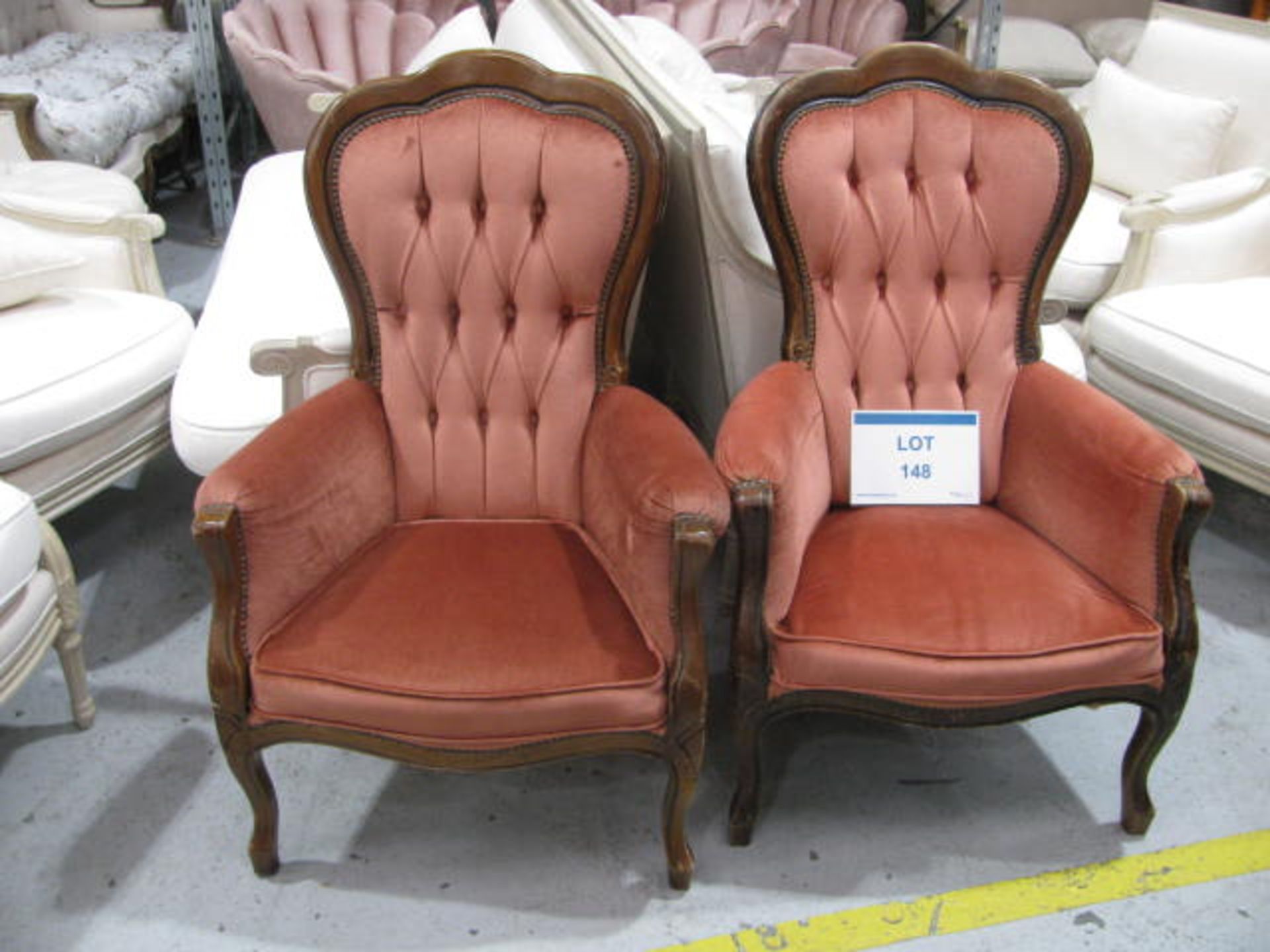 (2) Wooden framed button back fabric upholstered arm chairs