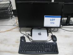 Apple Mac mini base unit with monitor, keyboard and mouse