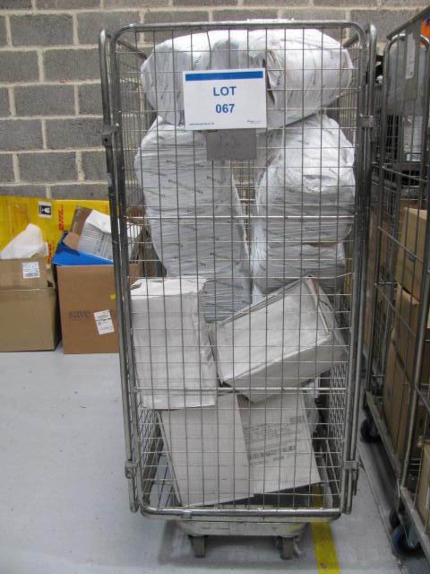 Steel framed trolley cage with contents of packing material