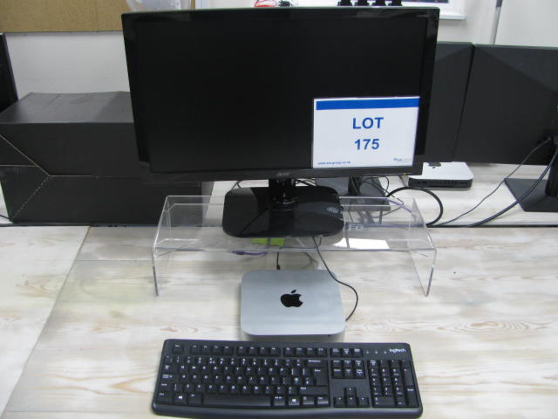 Apple Mac Mini base unit with Acer flat screen monitor, keyboard and mouse