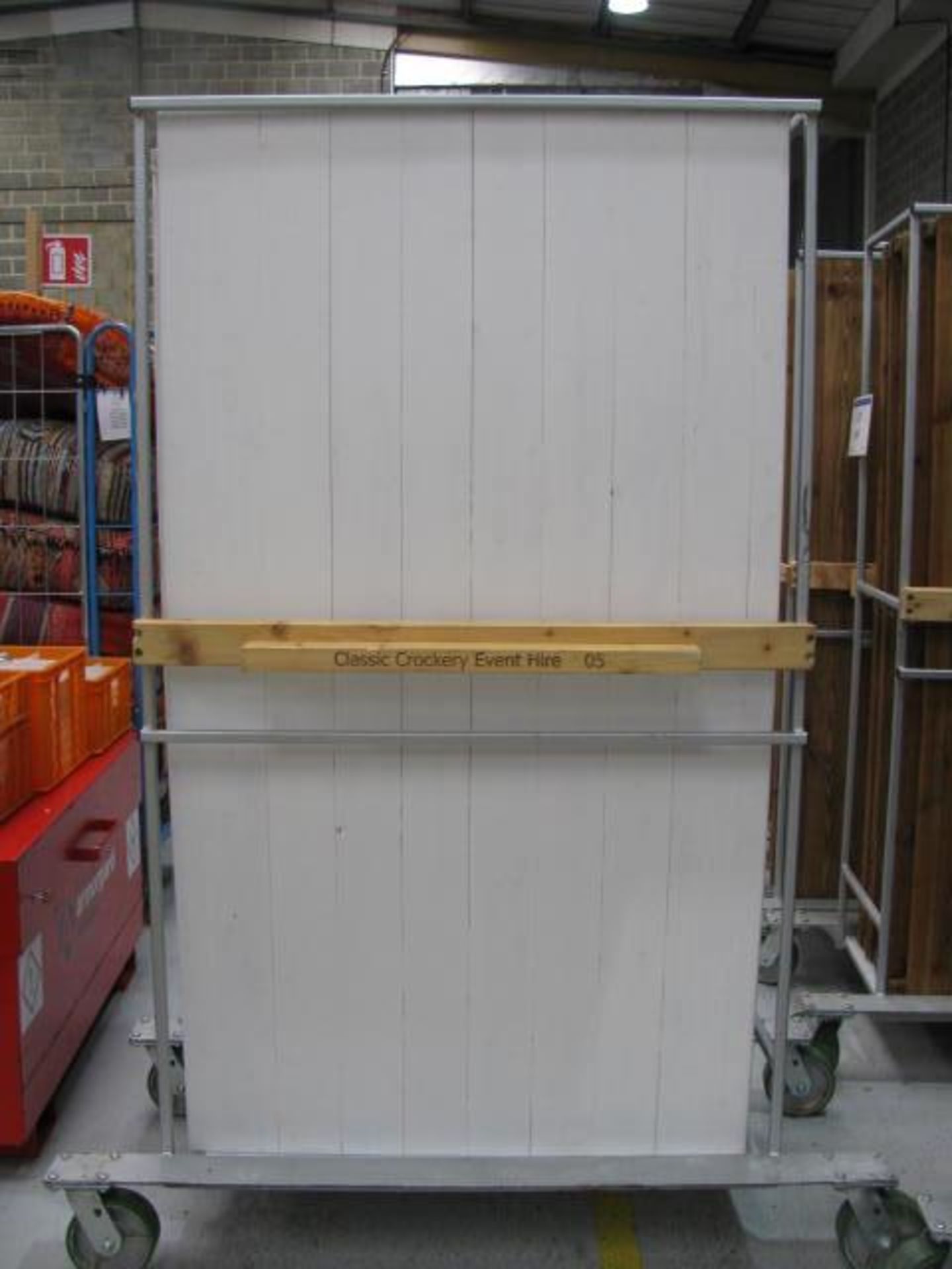 (24) Folding white timber topped tables on 3 trolleys - Image 2 of 3