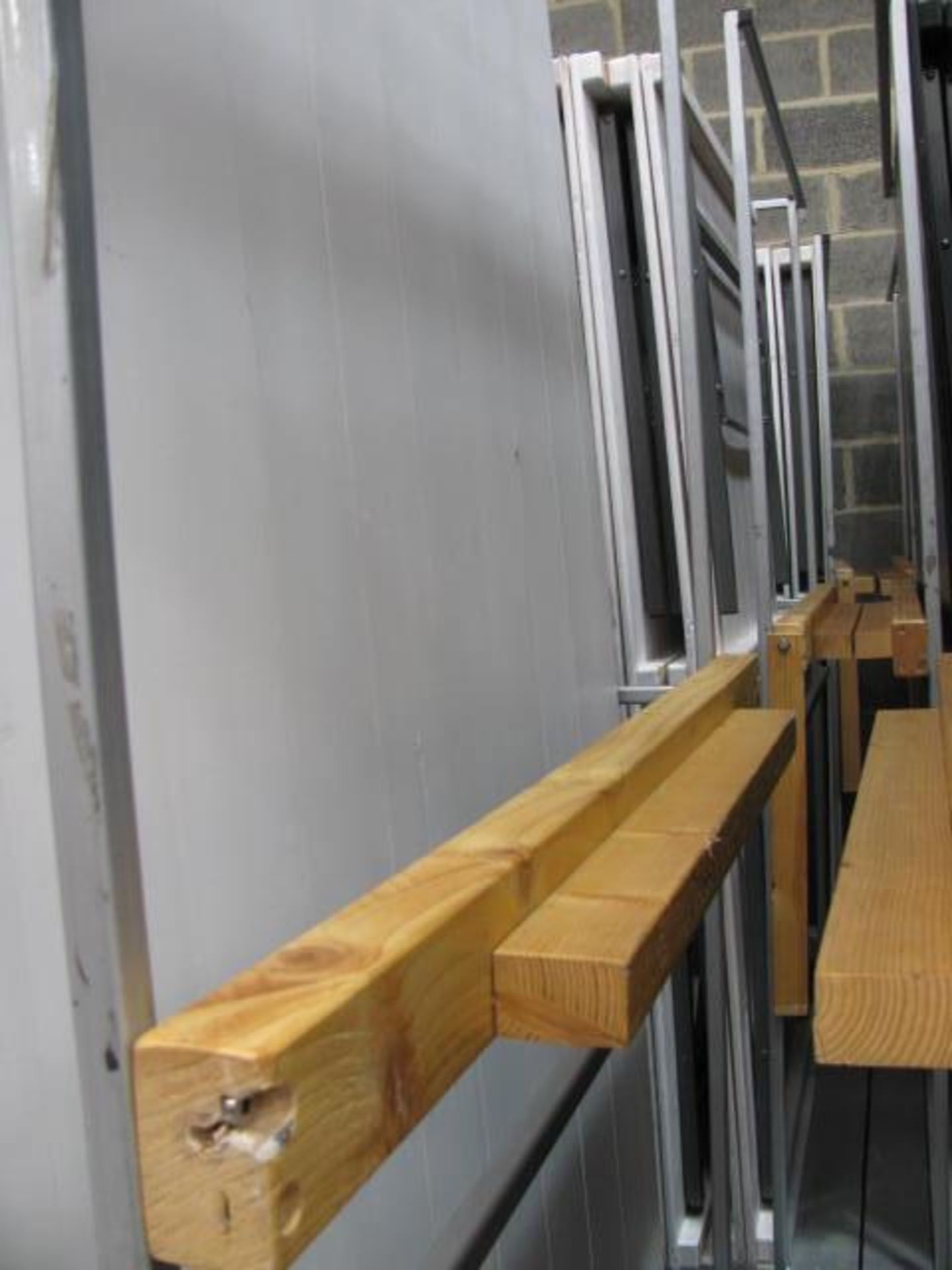 (24) Folding white timber topped tables on 3 trolleys - Image 3 of 3