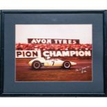 Signed and framed photograph of Stirling Moss at Goodwood, 23rd April, 1962