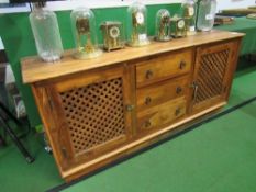 Hardwood sideboard with 3 centre drawers flanked by cupboards, 178 x 47 x 80cms. Estimate £40-60
