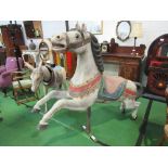 Hand-painted fibreglass carousel horse on original stand, length 183cms height 153cms. Estimate £