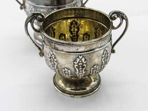 Silver hallmarked double ended egg cup, London 1904 & a pair of small silver double handled urns, - Image 2 of 3