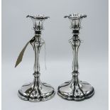 Art Nouveau pair of white metal candlesticks with worn out marks, complete with sconces