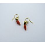 Pair of coral earrings. Estimate £75-100
