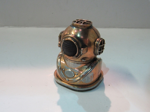 Paperweight pin cushion in the form of a deep sea diver's mask. Estimate £15-25