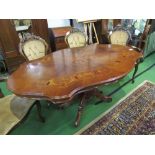 Inlaid shaped top dining table on heavy turned column to 4 shaped & carved legs.