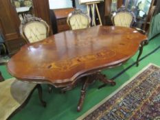 Inlaid shaped top dining table on heavy turned column to 4 shaped & carved legs.