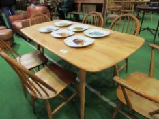 Ercol blonde coloured table, 153 x 76 x 70cms with 4+2 matching chairs. Estimate £300-350