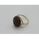 9ct gold red stone cluster ring, weight 3.8gms, size P