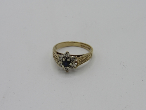 9ct gold diamond & black stone flower ring with pattern to shoulder, weight 2.8gms, size M 1/2