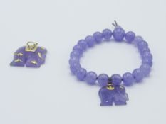 14ct gold mounted lavender jade elephant pendant & matching bracelet. Estimate £15-20