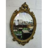 Decorative gilt framed wall mirror, 72 x 46cms. Estimate £10-20