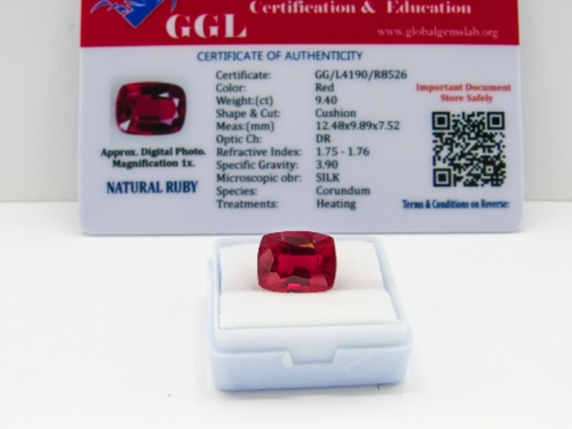 Cushion cut loose red ruby, weight 9.40ct, with certificate. Estimate £40-50