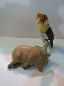 Goebel Toucan on branch, ref. 38538-20; Bernard Bloch sleeping pig, ref 7522. Estimate £40-60