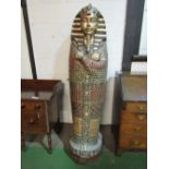 Life-size carved & painted Sarcophagus, opening to shelved interior, 50 x 53 x 195cms. Estimate £