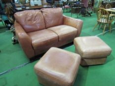 Tan leather 2 seater sofa & 2 matching pouffes by Sofitalia. Estimate £50-100