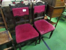 2 Edwardian chairs upholstered in red velvet. Estimate £10-20