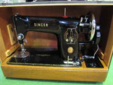 Singer, model 2O1K EJ 98467 manual sewing machine in carry case. Estimate £20-30