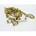 15ct gold Victorian brooch with a green stone set in a heart with seed pearl (a/f) together with a