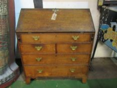 Early 19th century oak bureau (interior requires renovation) with dummy drawer over 2 over 2