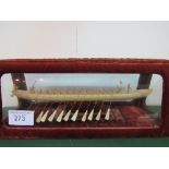 Carved bone model of an Egyptian rowing vessel in velvet & glass case. Estimate £50-100