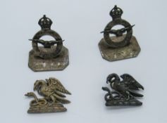 Pair of silver Royal Air Force Insignia on bases, inscribed underneath 'Gieves Ltd', 21 Old Bond