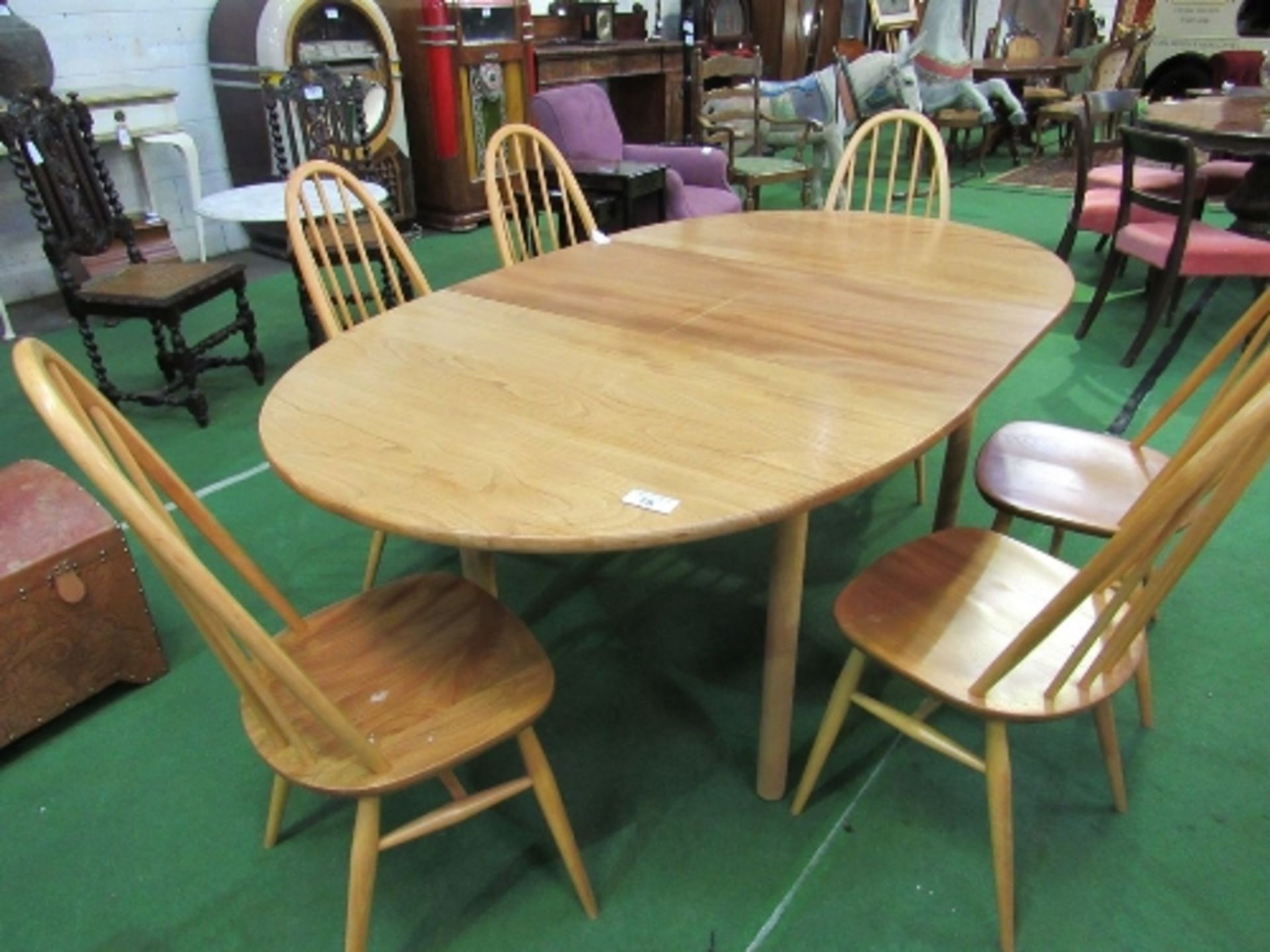 Ercol blonde coloured extendable dining table, 189cms (extended) x 107 x 74cms, together with 6 high