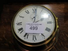 Ship's brass bulk head clock. Estimate £20-30