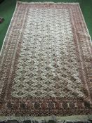 Light brown ground patterned rug, 247 x 157. Estimate £50-70
