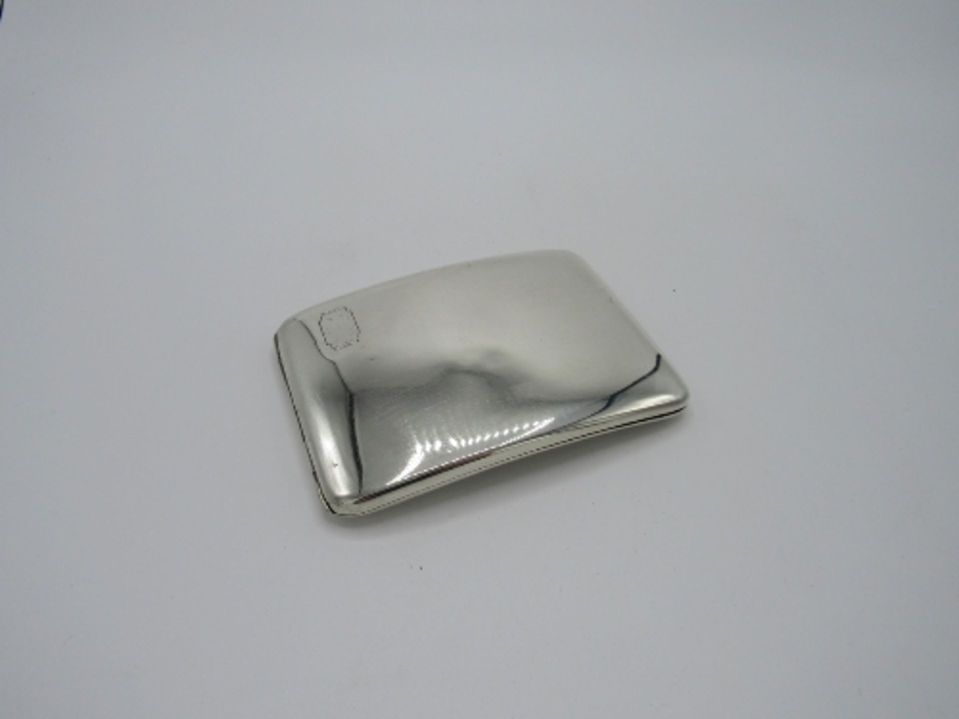 Beautifully simple unmonogrammed cigarette case by Garrards & Co, London. This elegant piece has a