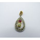 Platinum & yellow gold pendant with champagne diamond & ruby, weight 2.7gms. Estimate £350-400