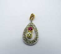 Platinum & yellow gold pendant with champagne diamond & ruby, weight 2.7gms. Estimate £350-400