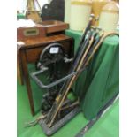 Cast iron stick stand together with collection of walking sticks & canes. Estimate £20-30