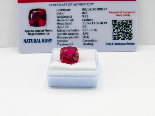 Cushion cut loose blue sapphire, weight 7.55ct, with certificate. Estimate £40-50
