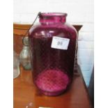 2 large purple glass candle holders. Estimate £20-30