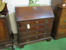 Georgian oak bureau with brass fittings & fitted interior, complete with purchase invoice dated