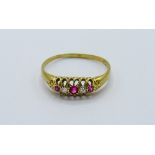 18ct gold diamond & red stone ring, weight 2.5gms, size U. Estimate £150-170