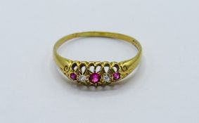 18ct gold diamond & red stone ring, weight 2.5gms, size U. Estimate £150-170