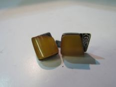 Russian 875 silver & amber cufflinks. Estimate £25-35