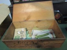 A pine box containing various packets of Carters Seeds. Estimate £20-40