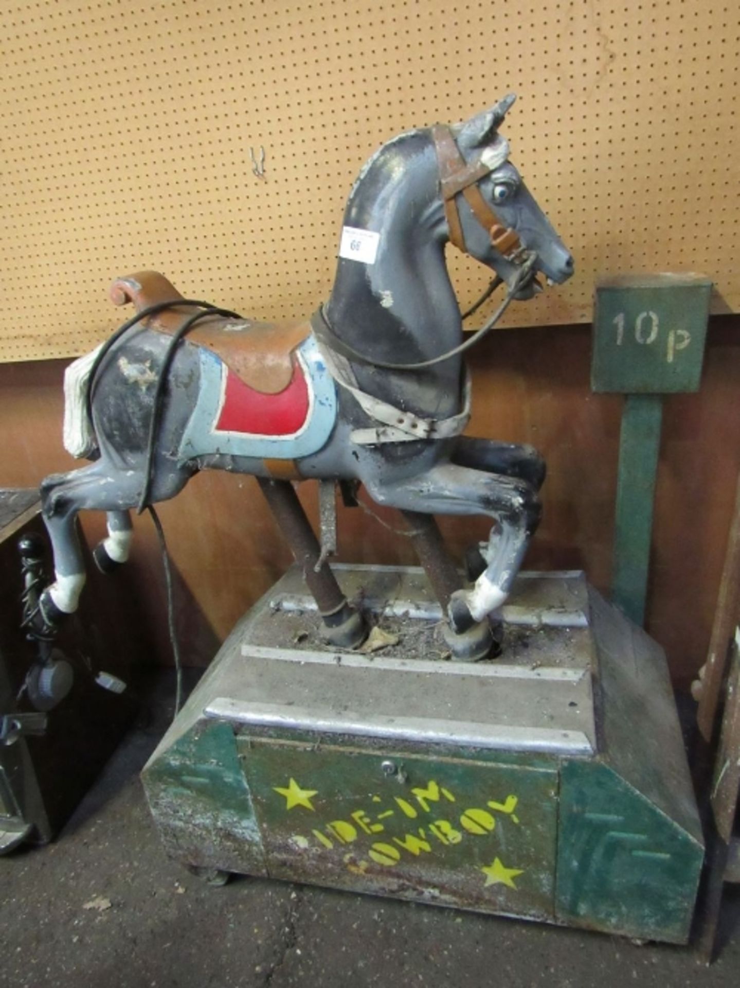 Mechanical/electric amusement arcade children's ride-on horse, height 132cms x 115cm length.