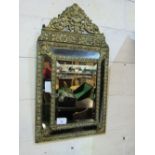 Very decorative brass & glass framed wall mirror, part bevel-edged glass, 95 x 55cms. Estimate £40-